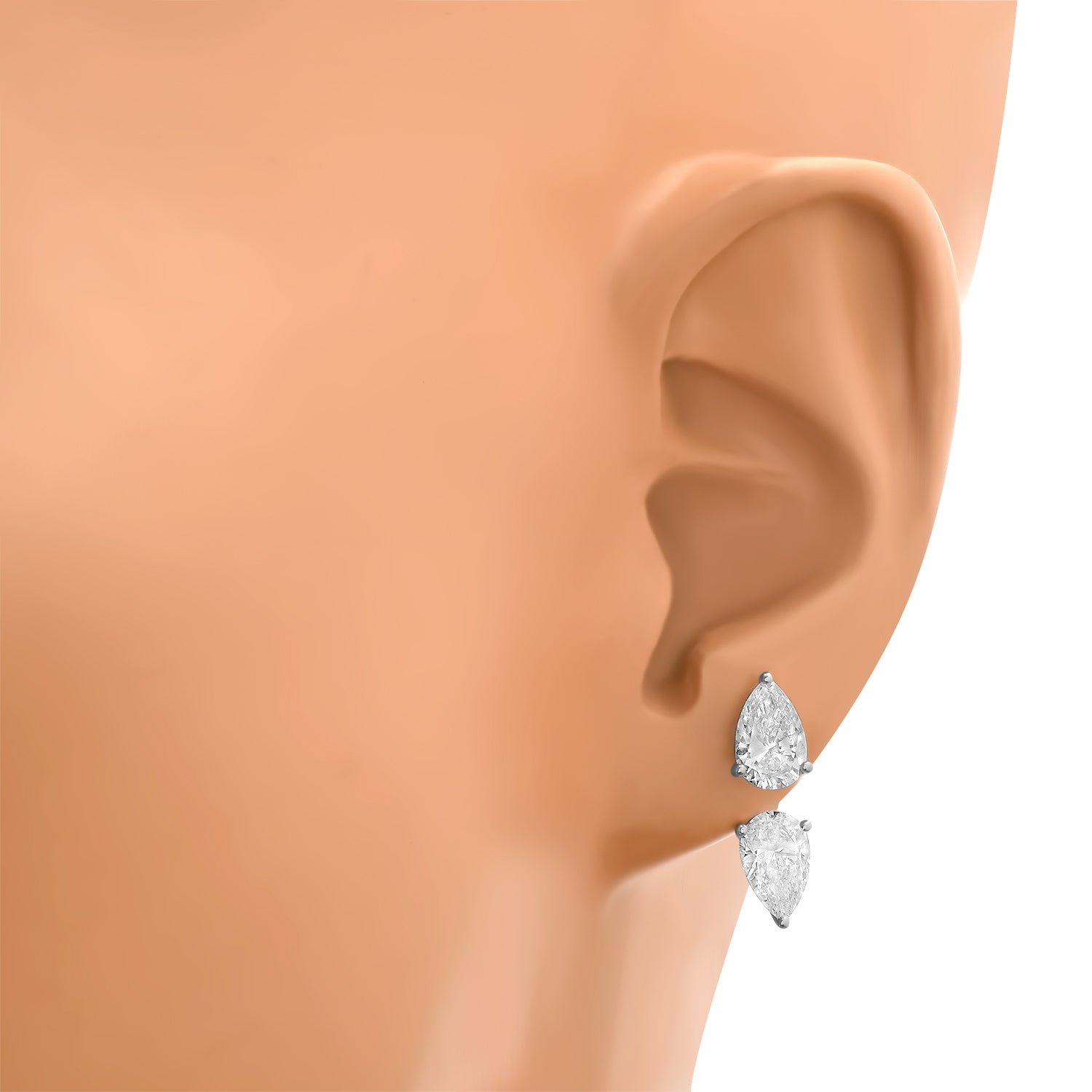 Close-up of pear shape lab diamond earrings showing VVS clarity and E-F color